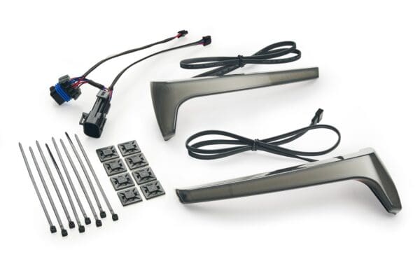 A set of parts for the car with wires and cables.